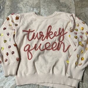 QUEEN OF SPARKLES Embroidered Sweater - Cream with Red and Yellow Accents